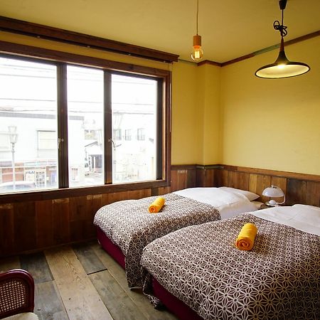 Hakuba Station Guesthouse En المظهر الخارجي الصورة