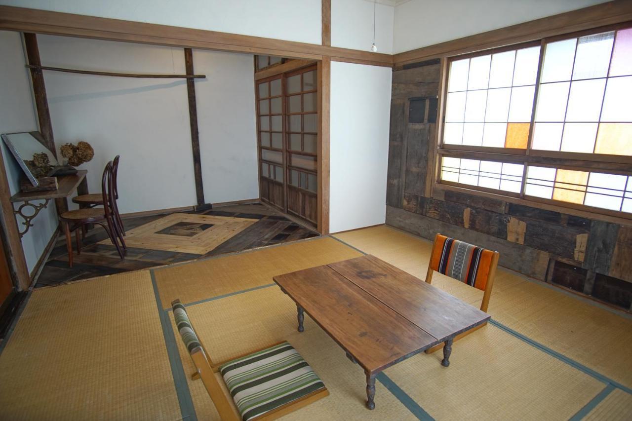 Hakuba Station Guesthouse En المظهر الخارجي الصورة
